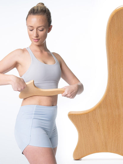 Wooden Gua Sha Massage Tool Leg Muscle Soreness and Relaxation